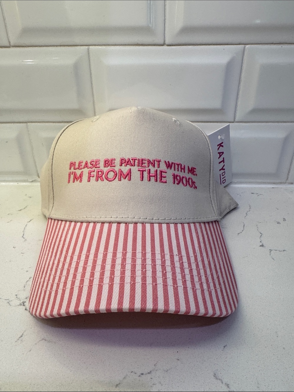 Katydid Beige Cap with Pink Embroidered Slogan and Striped Brim